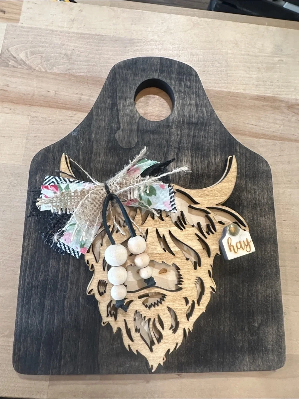 Wooden Highland Cow Wall Accent in Black and Natural